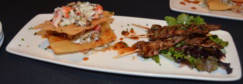 Lobster and Lump Crab, Spiced Lime Vinaigrette, on top of Crispy Wonton and Sesame Beef Skewer
